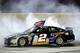 Brad Keselowski slid past Kasey Kahne to score his first Sprint Cup win in over a year.