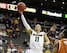 Mar 9, 2012; Kansas City, MO, USA; Missouri Tigers guard Michael Dixon Jr. (11) drives basket against the Texas Longhorns during the second half of the semifinal round of the Big 12 Tournament at the Sprint Center. Missouri defeated Texas 81-67. Mandator