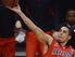 Mar 28, 2013; Los Angeles, CA, USA; Arizona Wildcats guard Nick Johnson (13) shoots during the second half of the semifinals of the West regional of the 2013 NCAA tournament against the Ohio State Buckeyes at the Staples Center. Mandatory Credit: Jayne Ka
