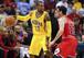 C.J. Watson (L) faced his former team, the Chicago Bulls, in an Oct. 5 preseason game at Bankers Life Fieldhouse.