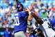 Charles Johnson (95) pressuring the 0-6 Giants' Eli Manning during the Panthers' Week 3 shutout win.
