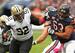 John Jenkins shakes off a block against the Bears