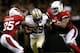 Khiry Robinson runs through two Arizona defenders