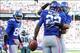 Wilson and Randle embrace after a score in 2012.