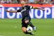 Inter's Esteban Cambiasso (acquired in 2004) goes for a loose ball in this season's league opener against Genoa.