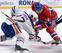 Tomas Plekanec takes a faceoff against Edmonton.