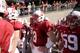 Hogan (center) will have to do more than just manage the game on Saturday.