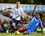 Tom Huddlestone tackles Lewis Holtby.