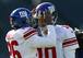 Team leaders Eli Manning and Antrel Rolle.