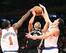 Amar'e Stoudemire and Pablo Prigioni get the block on Tony Parker