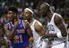Iman Shumpert with Paul Pierce and Kevin Garnett in his ear