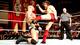 Daniel Bryan delivers a kick to Randy Orton