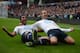 Paulinho and Roberto Soldado celebrate going 2-0 against Aston Villa.