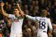 Erik Lamela and Jermain Defoe each scored in a 2-1 win for Tottenham Hotspur over Sheriff Tiraspol.