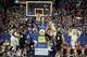 KU's Andrew Wiggins, seen here finishing an alley-oop in an exhibition game, is the talk of college hoops.