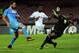 Gonzalo Higuain puts one of his two goals past Marseille keeper Steve Mandanda in Tuesday's match at the San Paolo.