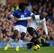 Sandro holds off Everton's Romelu Lukaku.