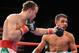Evgeny Gradovich upset Billy Dib to capture the IBF Featherweight Championship in their first bout.