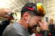 Ellsbury wiping his eyes; he can't believe what he's reading.