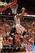 Melvin Ejim attempts to finish an alley-oop in Sunday's win over Michigan. Ejim scored 22 points in his season debut.