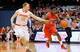 Guard Trevor Cooney has three steals playing at the top of the Syracuse zone.
