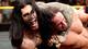 Judas Devlin grabs hold of Adrian Neville