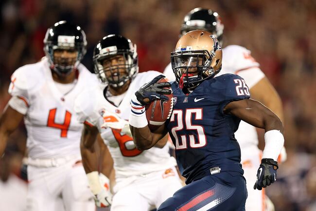 Hi-res-153404554-runningback-kadeem-carey-of-the-arizona-wildcats-rushes_crop_north