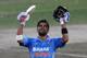 Smiles better: Kohli celebrates reaching the landmark of 5,000 ODI runs against West Indies