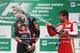 Alonso celebrates with Mark Webber on the podium
