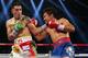 Pacquiao will take the sixth round as Floyd takes a break.