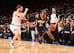 C.J. Watson (R) puts the move on the New York Knicks' Beno Udrih.