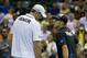 John Isner and Andy Roddick play in a charity exhibition in Florida.