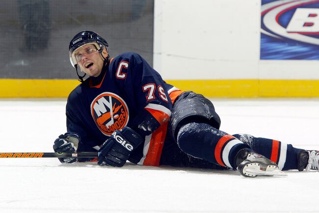 Hi-res-73922084-alexei-yashin-of-the-new-york-islanders-falls-to-the-ice_crop_north