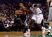 Indiana's Orlando Johnson tries to make a move on the Boston Celtics' Brandon Bass.