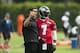 Bill Lazor talks to Michael Vick.