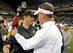 Sarkisian (left) must learn from his buddy Kiffin's (right) mistakes.