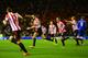 John O'Shea celebrates scoring against Chelsea on Wednesday.