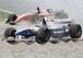 David Coulthard, probably not gaining an advantage in the gravel at the 1995 Canadian Grand Prix.