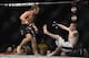 Faber (left) pursues a rocked McDonald (right) at UFC on Fox 9.
