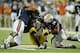 Auburn DL Elijah Daniel (left)