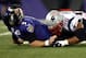 Joe Flacco was hit early and often by the Patriots defensive line.