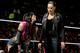 AJ Lee celebrates alongside Tamina Snuka.