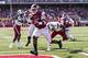 Collins (center) gave the Razorbacks reason for hope early on.