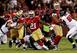 Running back Frank Gore (No. 21) runs for a chunk of his team-leading 97 yards against the Falcons.