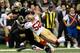 49ers inside linebacker Patrick Willis handled Saints tight end Jimmy Graham in coverage earlier this season.
