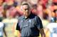 Hawaii's head coach Norm Chow is a former USC coordinator as well.