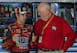 The late Benny Parsons talking with Jeff Gordon in 2006.