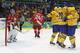 VANCOUVER, BC - FEBRUARY 19: Daniel Alfredsson #11 of Sweden celebrates his game-winning goal with teammate Henrik Sedin #20 of Sweden against goalkeeper Andrei Mezin #31 of Belarus during the ice hockey men's preliminary game on day 8 of the Vancouver 2