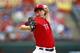 Derek Holland posted a 10-9 record in 2013.