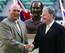 Mark Edmondson (left), with the bust of his likeness at the Australian Open venue